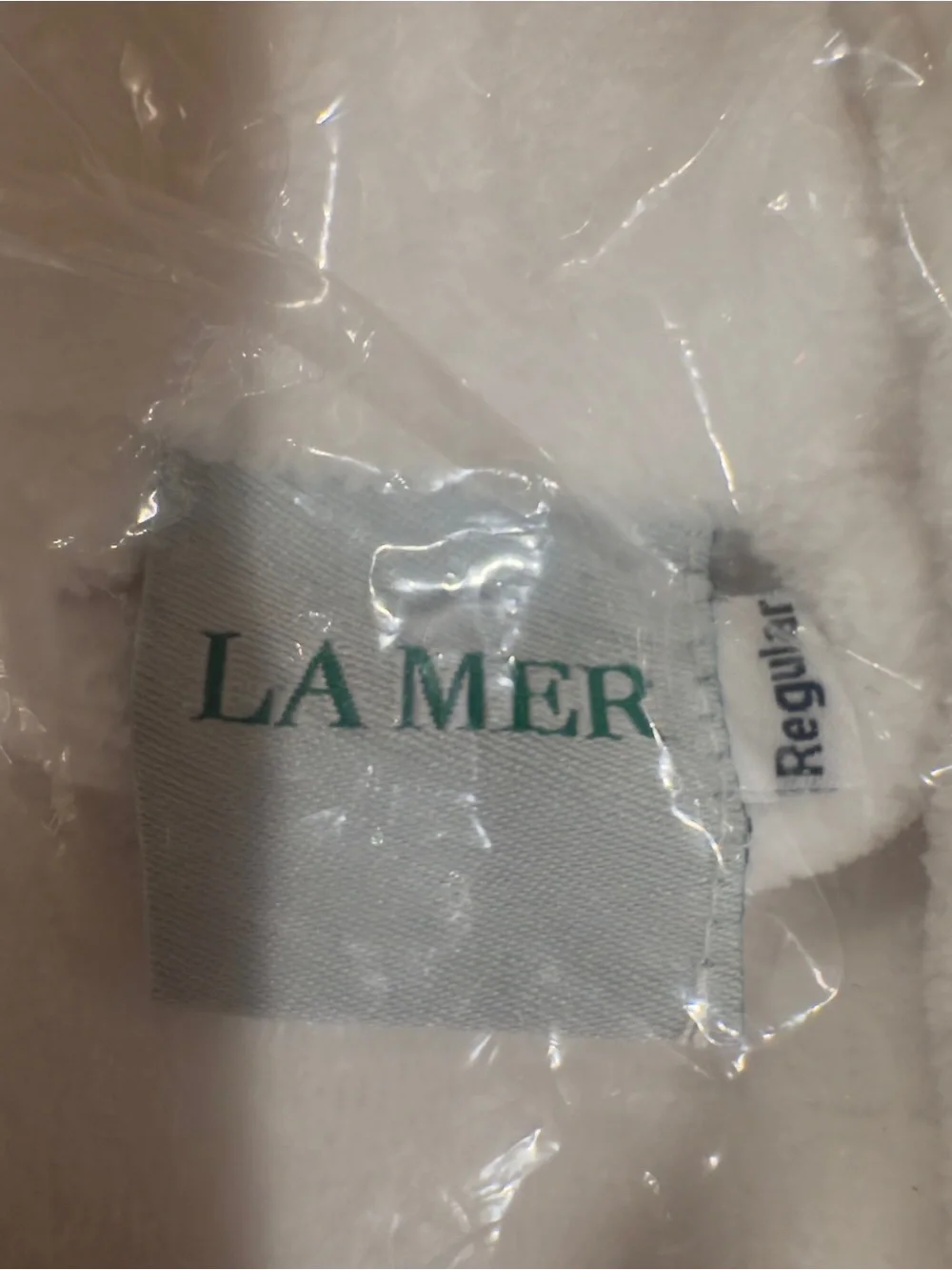 La Mer White Luxury Plush Robe with Embroidered Logo.